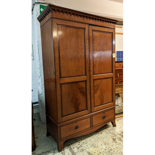 179 - WARDROBE, 137cm x 61cm x 210cm H, late Georgian satinwood and crossbanded with two panelled doors en... 