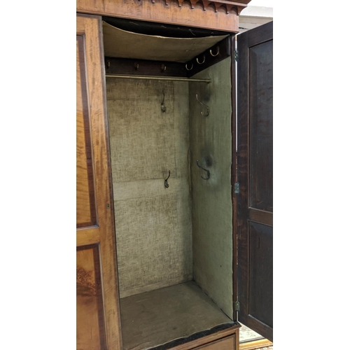 179 - WARDROBE, 137cm x 61cm x 210cm H, late Georgian satinwood and crossbanded with two panelled doors en... 