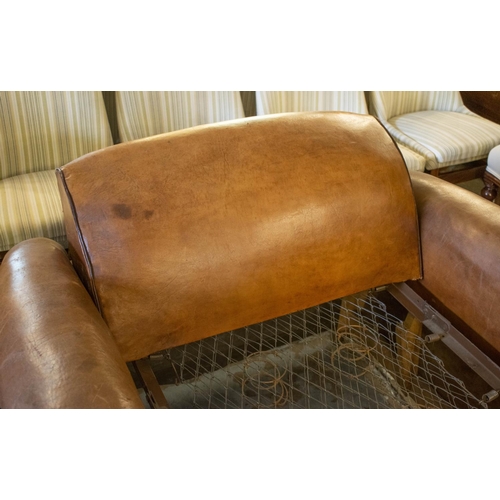 265 - ARMCHAIR BED, French Art Deco, brown leather, circa 1925, with retractable spring bed base, chair 78... 