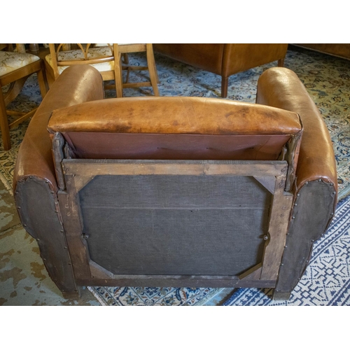 265 - ARMCHAIR BED, French Art Deco, brown leather, circa 1925, with retractable spring bed base, chair 78... 