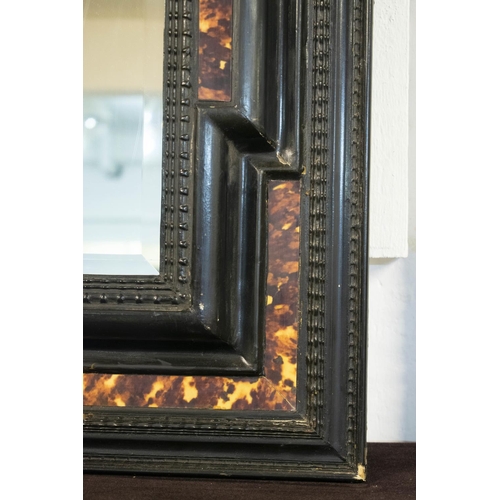 267 - PUB WALL MIRROR, 89cm H x 78cm W, Flemish style ebonised and tortoise shell effect with inscribed pl... 