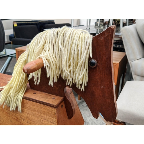 386 - ROCKING HORSE, 120cm x 50cm x 80cm, vintage 1950s pine with wool work mane.