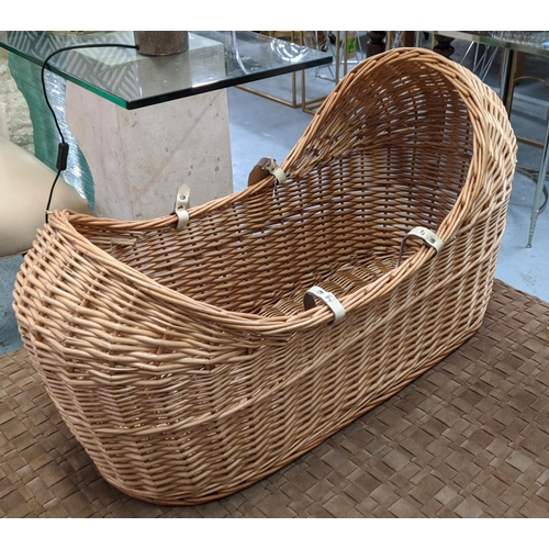 387 - WICKERWORK CRIB, 90cm x 38cm x 50cm, with two handles.