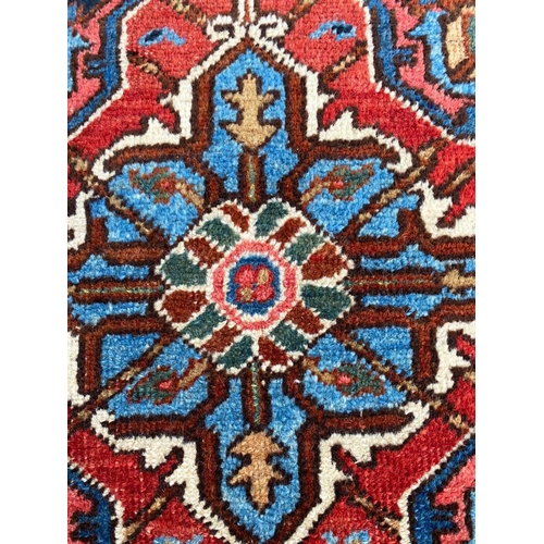 81 - ANTIQUE HERIZ CARPET, 265cm x 173cm.