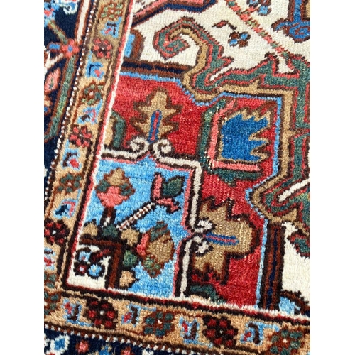 81 - ANTIQUE HERIZ CARPET, 265cm x 173cm.