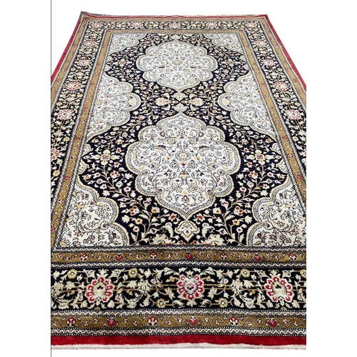 86 - FINE QUM SILK RUG, 210cm x 135cm.