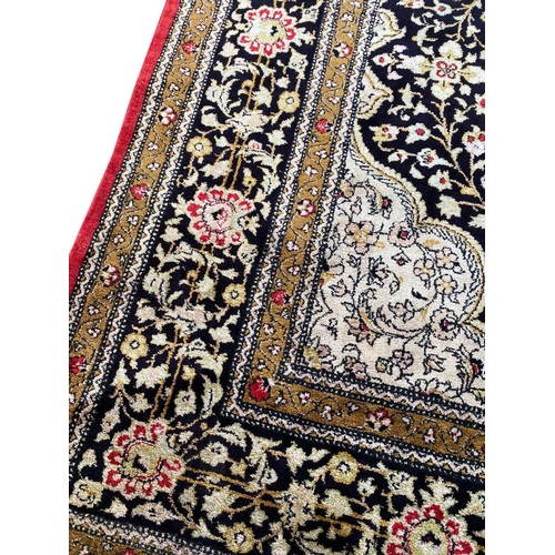 86 - FINE QUM SILK RUG, 210cm x 135cm.