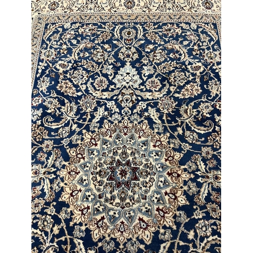 99 - NAIN CARPET, 305cm x 193cm.