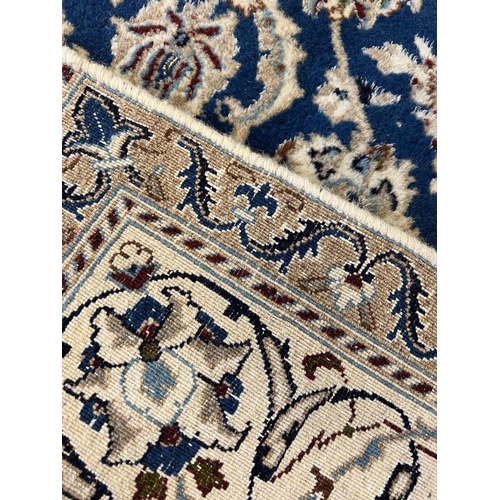 99 - NAIN CARPET, 305cm x 193cm.