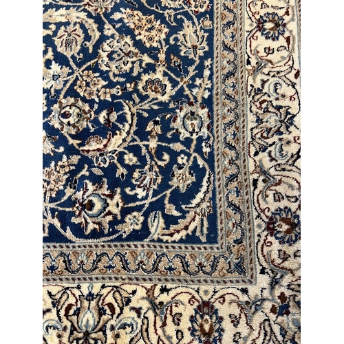 99 - NAIN CARPET, 305cm x 193cm.