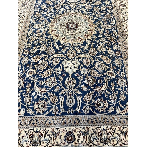 99 - NAIN CARPET, 305cm x 193cm.