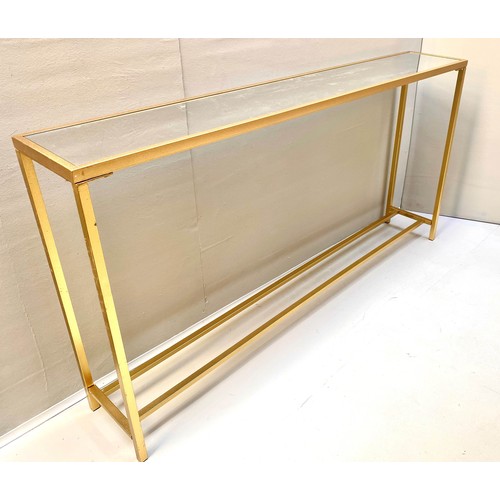 408 - CONSOLE TABLE, gilt metal, mirrored top, 79cm x 152cm x 25cm.