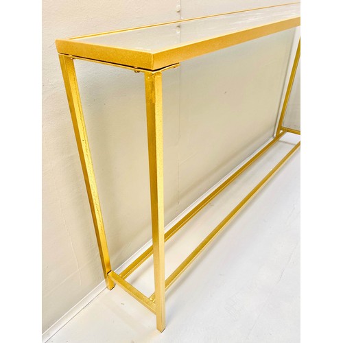 408 - CONSOLE TABLE, gilt metal, mirrored top, 79cm x 152cm x 25cm.