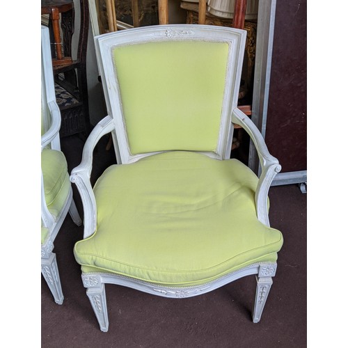 177 - FAUTEUILS, a pair, each 62cm x 93cm H, 20th century with white painted show frames and pale lime uph... 