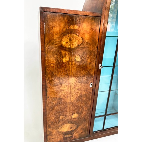 139 - ART DECO DISPLAY CASE, burr walnut with arch glazed, shelved section flanked by panelled doors, 122c... 