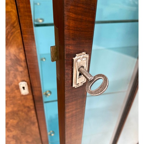 139 - ART DECO DISPLAY CASE, burr walnut with arch glazed, shelved section flanked by panelled doors, 122c... 