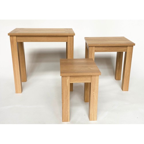 140 - NEST OF TABLES, three rectangular oak, 58cm x 35cm x 58cm H. (3)