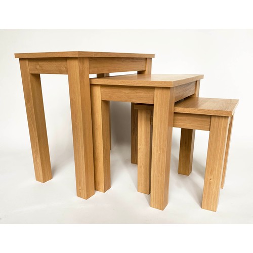 140 - NEST OF TABLES, three rectangular oak, 58cm x 35cm x 58cm H. (3)