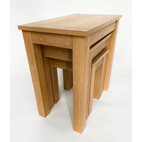 140 - NEST OF TABLES, three rectangular oak, 58cm x 35cm x 58cm H. (3)