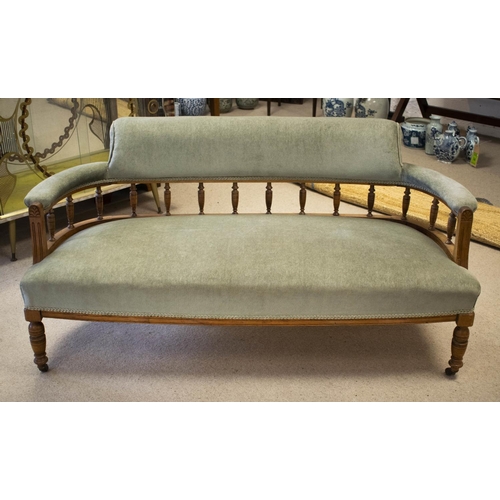 156 - SOFA, 70cm H x 140cm W, late Victorian walnut in green velour on ceramic castors.