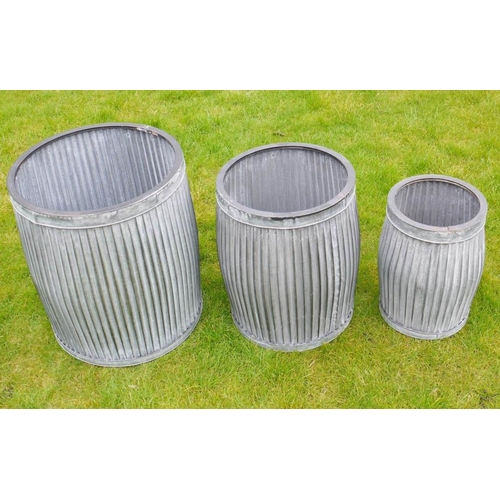 375 - PLANTERS, a set of three graduated, largest measuring 50cm H x 45cm diam. (3)