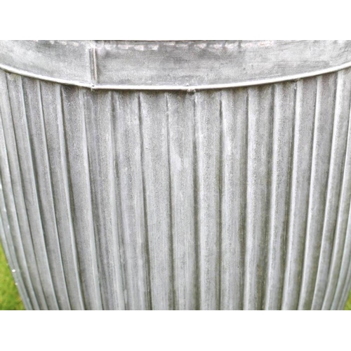 375 - PLANTERS, a set of three graduated, largest measuring 50cm H x 45cm diam. (3)