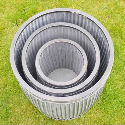 375 - PLANTERS, a set of three graduated, largest measuring 50cm H x 45cm diam. (3)