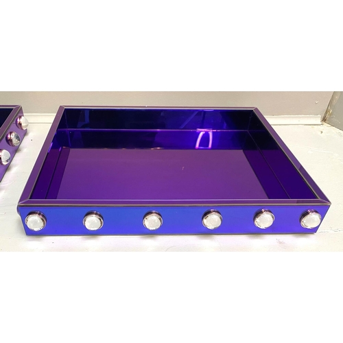 403 - COCKTAIL TRAYS, a pair, electric blue mirrored glass, 7x53x43. (2)