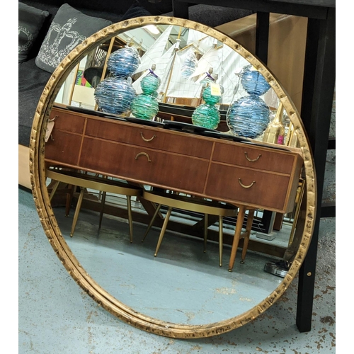 447 - CIRCULAR WALL MIRROR, aged gilt finished textural frame, 92cm diam.