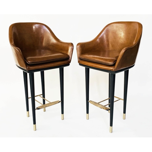 366 - BAR STOOLS, a pair, 107cm H (seat 75cm H), 1970's Danish style, tan leather, raised upon tapering br... 