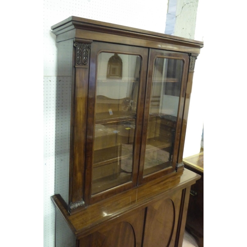 156 - BOOKCASE, 110cm W x 183cm H x 37cm D William IV mahogany with two glazed doors enclosing shelves abo... 