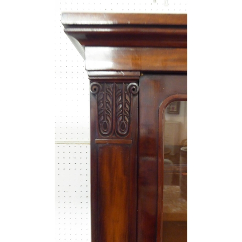 156 - BOOKCASE, 110cm W x 183cm H x 37cm D William IV mahogany with two glazed doors enclosing shelves abo... 