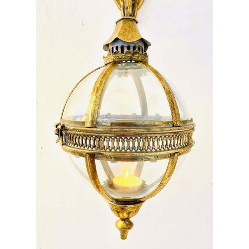 331 - WALL HANGING CANDLE LANTERNS, a pair, Regency style, globular, gilt metal frames, 75cm H. (2)