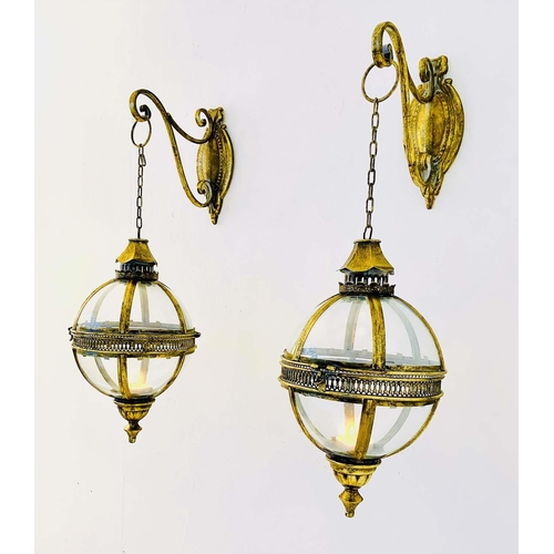 331 - WALL HANGING CANDLE LANTERNS, a pair, Regency style, globular, gilt metal frames, 75cm H. (2)