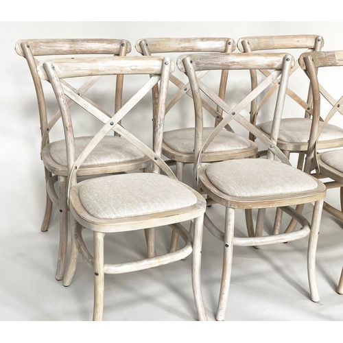 206 - OKA DINING CHAIRS, a set of six, lime washed fruitwood with X backs and linen seats. (6)