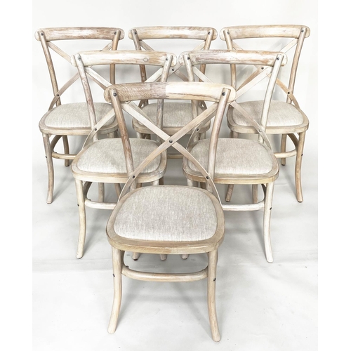 206 - OKA DINING CHAIRS, a set of six, lime washed fruitwood with X backs and linen seats. (6)