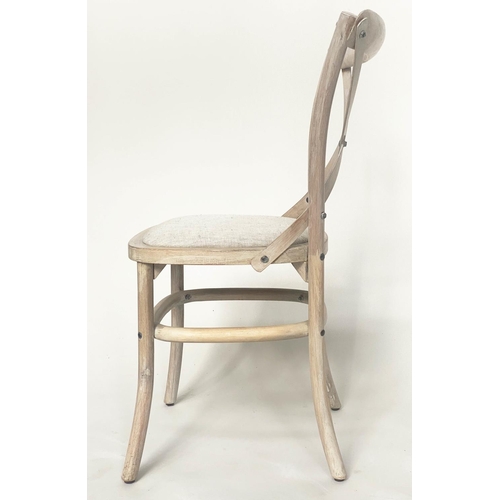 206 - OKA DINING CHAIRS, a set of six, lime washed fruitwood with X backs and linen seats. (6)