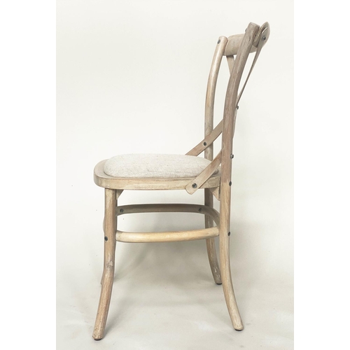 206 - OKA DINING CHAIRS, a set of six, lime washed fruitwood with X backs and linen seats. (6)