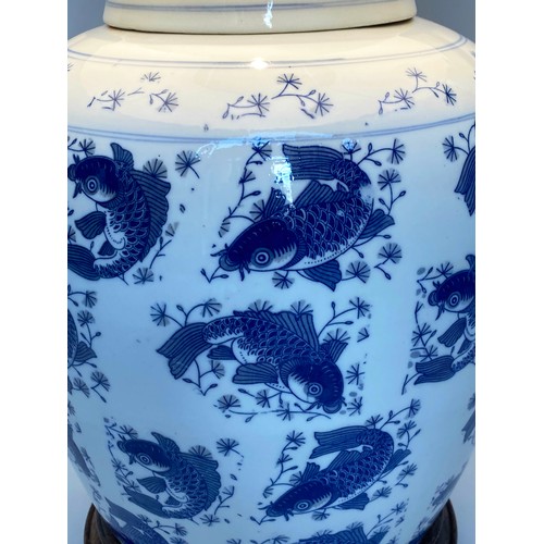 203 - CARP TABLE LAMP, 80cm H, large Chinese blue and white ceramic, of lidded vase form on wooden base (a... 