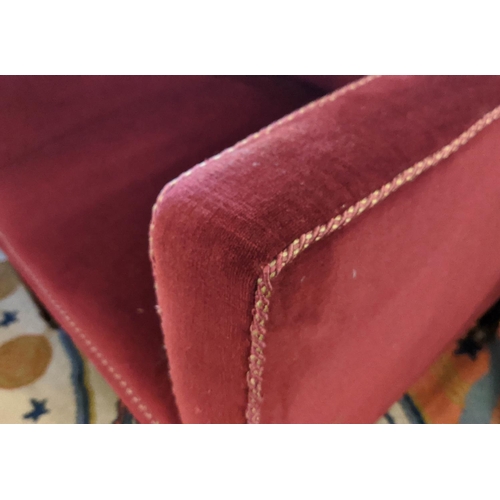 141 - ARMCHAIRS, 87cm H x 62cm W, a pair, Edwardian mahogany in red velvet on brass front castors and cera... 