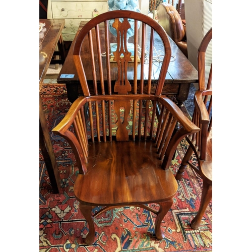 146 - WINDSOR ARMCHAIRS, 110cm H x 60cm W, a pair, Georgian style hardwood. (2)