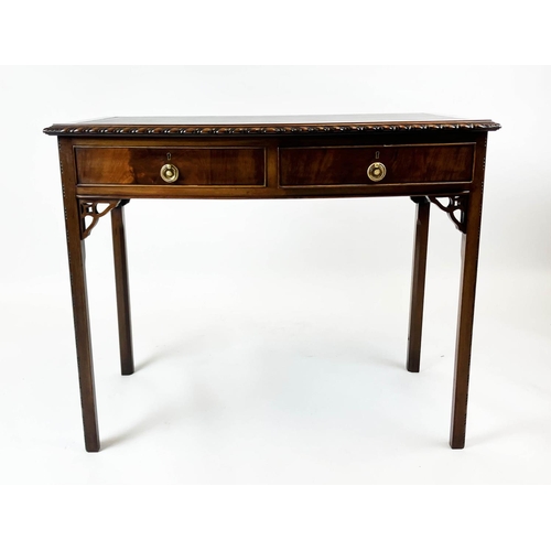 192 - BOWFRONT SIDE TABLE, early 20th century George II style, mahogany with two drawers with leather line... 