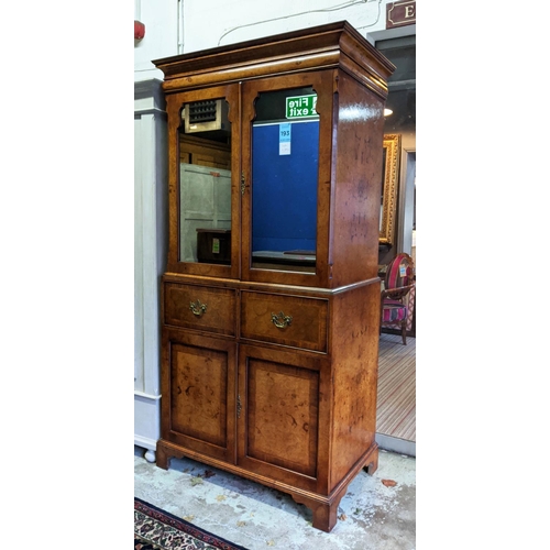 193 - SECRETAIRE CABINET, 98cm W x 198cm H x 58cm D George I style walnut with two mirrored doors above a ... 