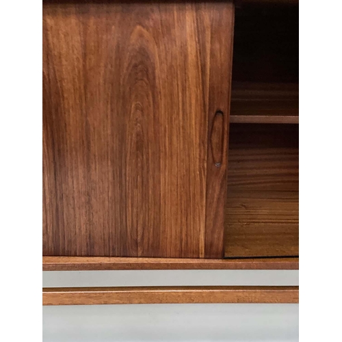 304 - AUSTIN SUITE SIDEBOARD, 1970s teak with three short drawers and pair of tambour doors and tapering s... 