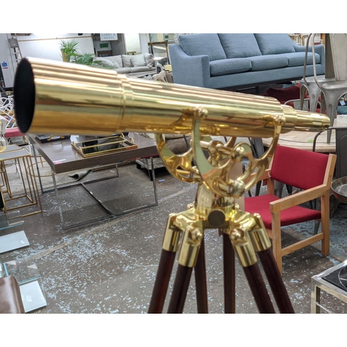 414 - ATTRIBUTED TO HELIOS OPTICS TELESCOPE, brass on wooden tripod base, 170cm at tallest.