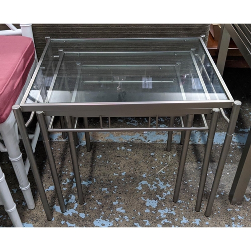 424 - NESTING TABLES, a set of three, metal and glass, 59cm x 45cm x 50cm. (3)