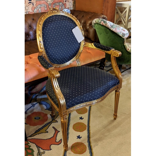 425 - FAUTEUIL, gilt 62cm W x 100cm H with black patterned upholstery.