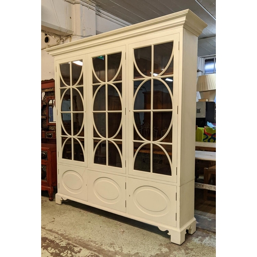 449 - CHALON BOOKCASE, 206cm W x 214cm H x 46cm D in a cream finish with a glazed upper part enclosing she... 