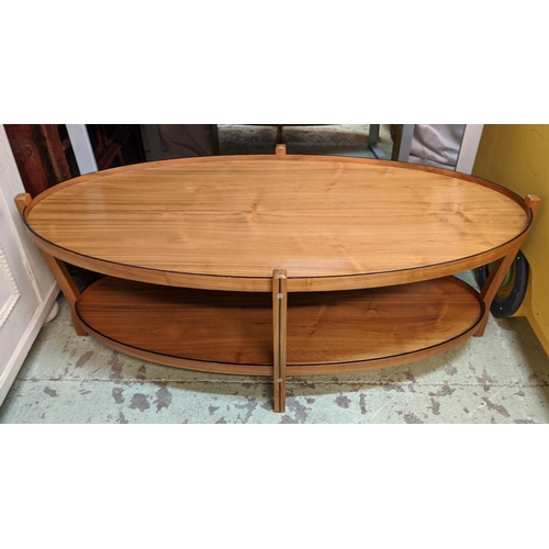 450 - LOW TABLE, 136cm W x 50cm H x 66cm D two tier oval walnut.