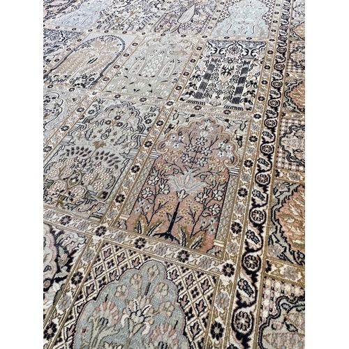 95 - GARDEN DESIGN SILK RUG, 220cm x 155cm.